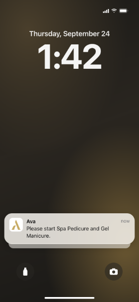 iPhone lock screen with an Aura Staff notification for Ava: Please start Spa Pedicure and Gel Manicure.